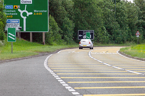 Why are these yellow lines painted across the road? - Why are these yellow lines painted across the road?