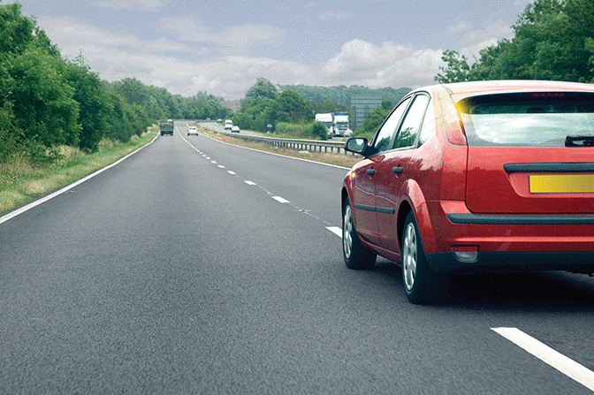 You're driving along this road. What should you do if the red car cuts in close in front of you? - You're driving along this road. What should you do if the red car cuts in close in front of you?